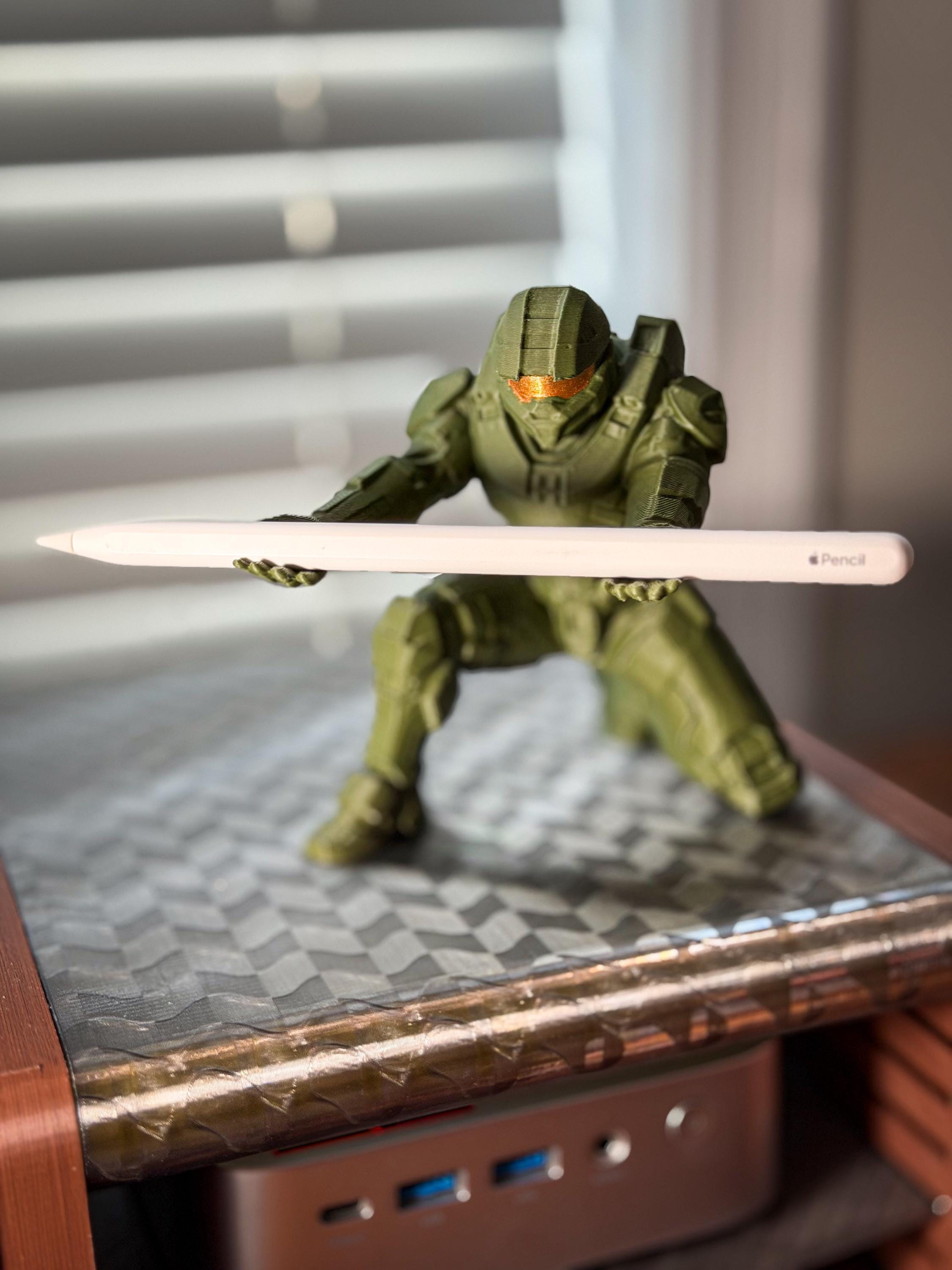 Halo-inspired Master Chief pen holder holding a pen